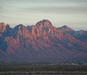 The Organ Mountains are a backdrop for the Chihuahuan Desert and encroaching city of Las Cruces.