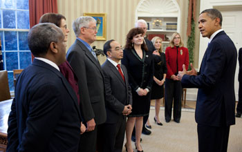 President Obama greeting the 2010 and 2011 PAESMEM awardees on Dec. 12, 2011.