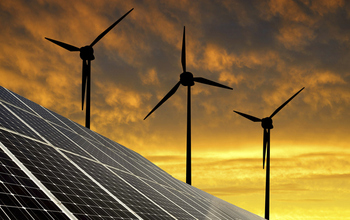 photo of wind turbines and solar panels