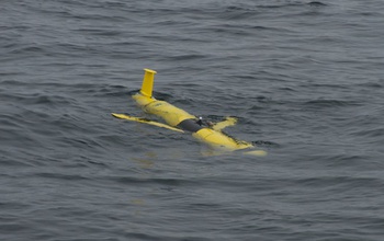 A coastal glider floats along the ocean surface, soon to sample water.