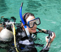 Biogeochemist Anne Cohen with diving gear.