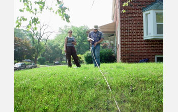 Two technicians collect data as part of the Baltimore Ecosystem Study (BES)