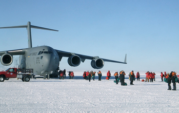 A C-17 and people at McMurdo Station in 2011