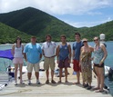 Paul Sikkel  with colleagues standing next to water at Virgin Islands Environmental Resource Station