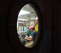 Lead scientist Ben Van Mooy processed data aboard ship late into the evening.