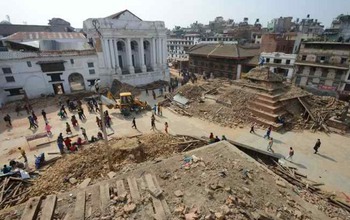 People and collapsed buildings in Durbar Square in Kathmandu, after the quake.
