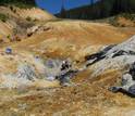 Open pit near Crater Lake, Oregon, showing blue clay sampled by scientist Keith Morrison.