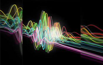 An artist's depiction of a coherent, laser-like X-ray pulse with the largest color spread generated to date