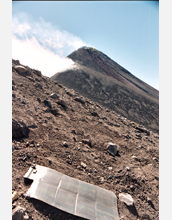 A small explosion from Fuego, an open vent volcano located 20 miles west of Guatemala City