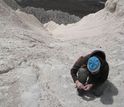 Regan Dunn prospecting for fossil mammals at Gran Barraca, Chubut, Argentina.