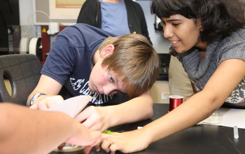 Students work on digital fabricated speaker system.