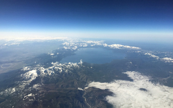 Clouds and haze in an aerial photo of Lake Tahoe on the California-Nevada border.