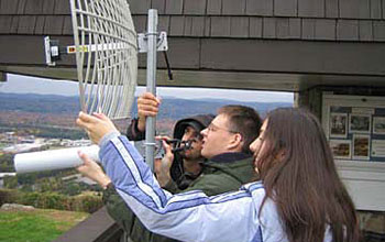 Photo of CASA ERC students deploying an off-the-grid, wireless radar system in Puerto Rico.