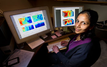 Oceanographer Amala Mahadevan with a model showing the role of eddies in the bloom.