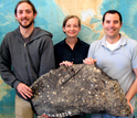 UCSB's Christopher Farwell, Sarah Bagby and David Valentine with a piece of asphalt volcano.