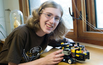 Photo of Anna Kornfeld Simpson with her robot