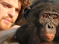 Photo of Duke University anthropologist Brian Hare with one of his bonobo subjects.