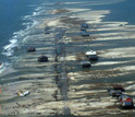 Aerial image  showing houses and flooded land on Dauphin Island, Ala.,