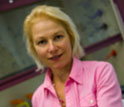 Photo of Caltech materials science expert Julia Greer holding micro-lattice ultralight metal.