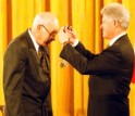 John Cahn receives the Medal of Science from President Clinton.