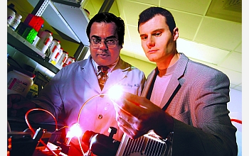 Vadim Backman and Hemant Roy demonstrate a portable version of the new spectroscopy tool.
