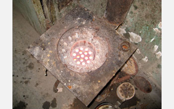 Photo of a coal burning stove in a village outside of Beijing blazing hot.