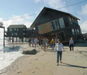 Photo showing damaged beachfront house in Rodanthe, N.C. caused by Hurricane Isabel.