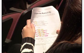 Photo of a student working through the North American Computational Linguistics Olympiad challenge.