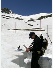 Photo of Tom Painter tracking radiation in June 2007.