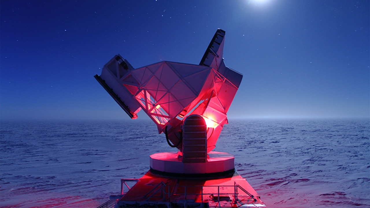 telescope glowing pink at night