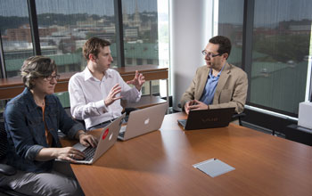 Working session with three members of the Carnegie Mellon research team.