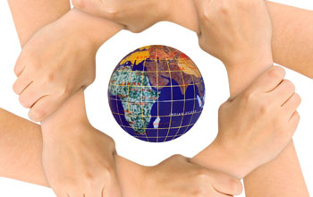 six hands locked together in a circle with the earth in the middle.