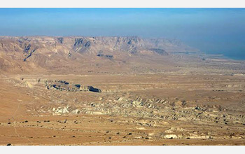 Photo of the arid mountain ranges flanking the Dead Sea. They reach 1,000 meters above water level.