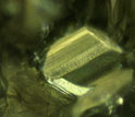 a hexagonal grain of iron sulfide that can be used to reveal the diamond's age.