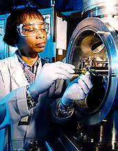 Photo of a woman researcher working in a lab