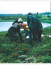 Scientists drill into frozen Siberian peat bogs to determine the bogs' impact on climate.