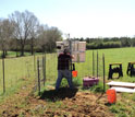 Photo of a solar panel being installed near the vault.