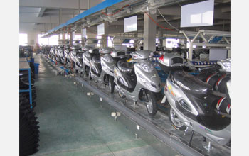 Photo shows e-bikes on a Chinese assembly line.