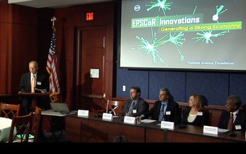 Speaker and four panelists with slide, EPSCoR Innovations: Generating a Strong Economy