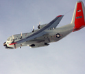 Photo of a LC-130 Hercules flying over NSF's Amundsen-Scott South Pole Station.