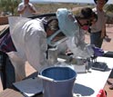 Photo showing biologists collecting blood samples from rodents to test for Hantavirus.
