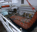 Photo of a trawl net carrying Alaskan pollock being brought aboard a U.S. vessel.