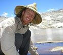 Photo of scientist Vance Vredenburg with one of the frogs he and colleagues study.