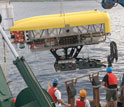 Photo of the hybrid remotely operated vehicle Nereus and the mother ship.