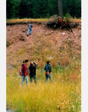 Students visit a scarp left by the 1959 magnitude 7.5 earthquake in Montana