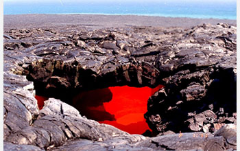Photo showing a lava skylight at Kilauea.