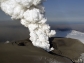 The eruption in Iceland after it penetrated Eyjafjallajökulls icecap; new ash covers the glacier.