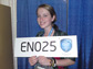 Julia Poje, at this years Intel International Science and Engineering Fair, holding a sign.