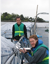 Scientists Max Zeigler and Karl Haase conduct experiments on ocean chemistry.