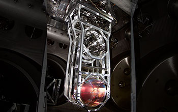 A LIGO test mass installed as fourth element in four-element suspension system